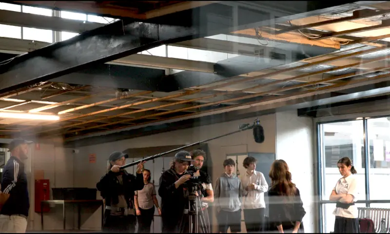 Film crew on location, behind the scenes